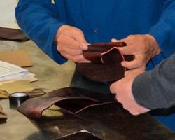 working with leather samples in leather application lab
