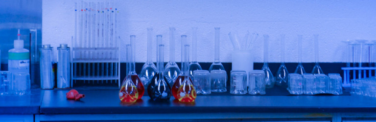 dye solutions prepared on a chemical lab table